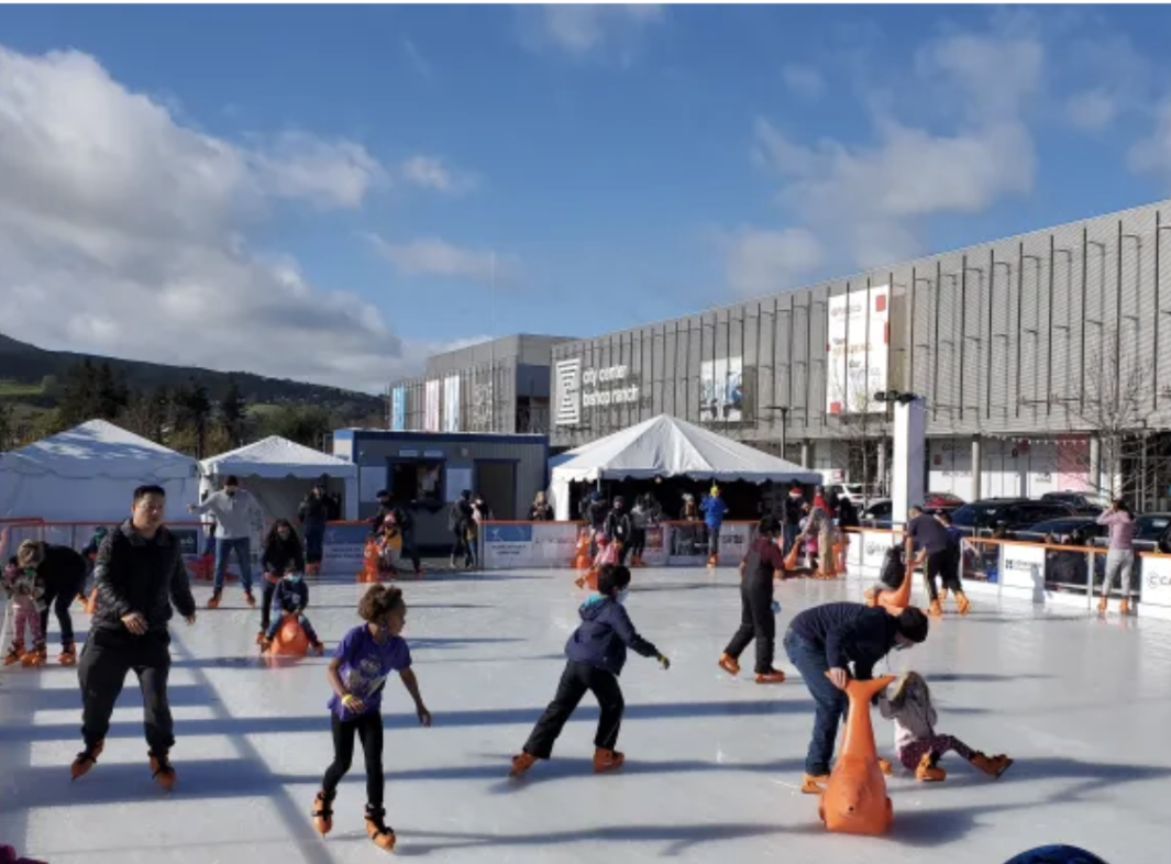 People skate in Kristi Yamaguchi Ice Skating Rink in Bishop Ranch City Center. 
